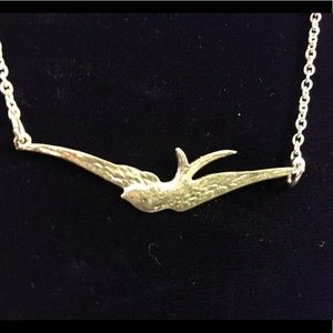 Pewter bird design on silver tone chain